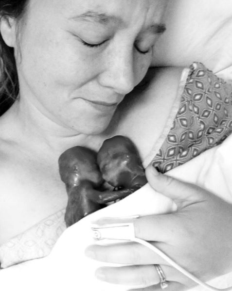Amanda Powell holds her premature identical twins Walker and Clark.
