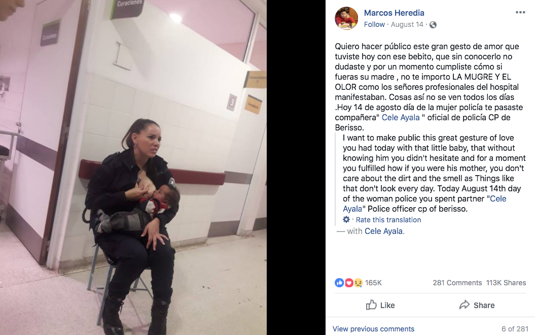 police officer breastfeeds baby